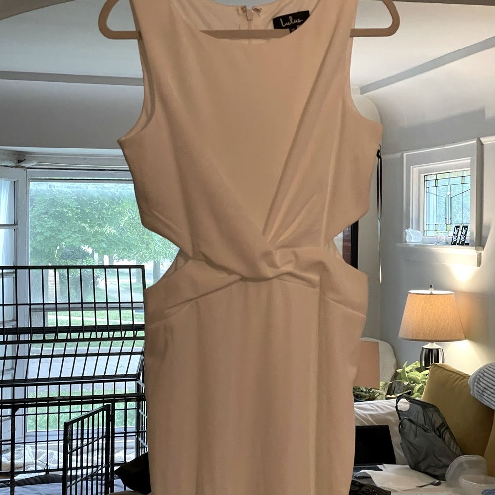 Beautiful, white , cut out sides maxi dress, never worn